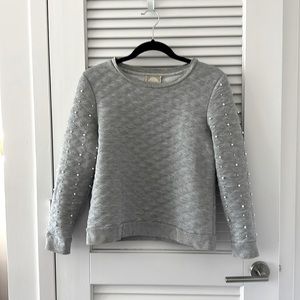 Alythea grey sweatshirt w/crisscross stitching & small pearls on arms.  Size S.